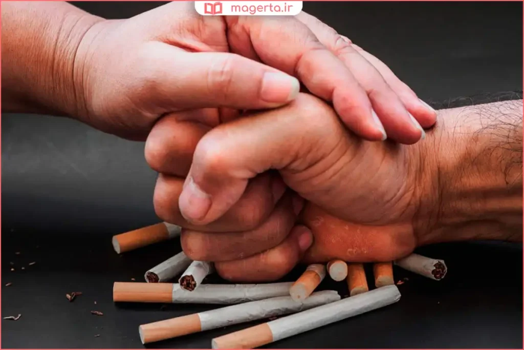فردی در حال شکستن سیگار به‌عنوان نماد ترک سیگار